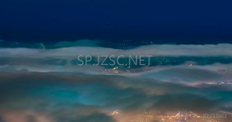 航拍视角云层下的城市夜景视频素材